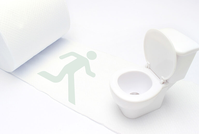 トイレに駆け込む人のイラスト